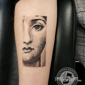 Tattoo Lina Cavalieri on the forearm motif: black and gray style: dotwork