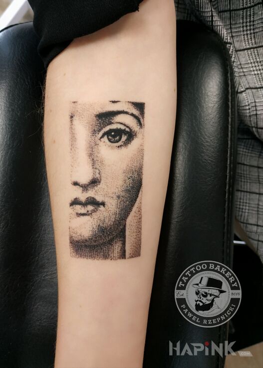 Tattoo Lina Cavalieri in faces motif and dotwork style on the forearm
