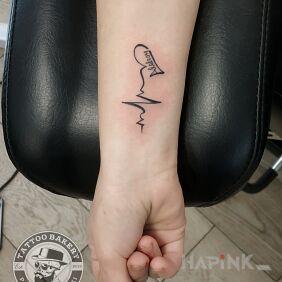 Tattoo Heart on the forearm motif: lettering style: minimalistic