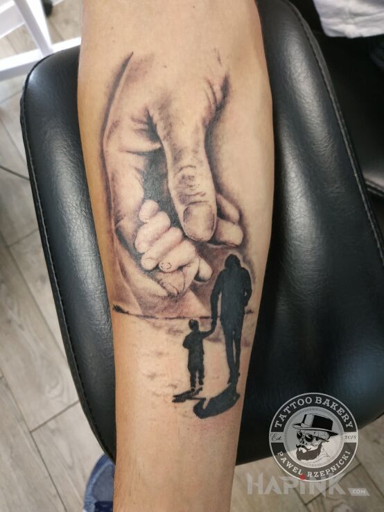 Tattoo Ojciec i syn in black and gray motif and realistic style on the forearm