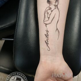 Tattoo Mother and child on the forearm motif: black and gray style: graphic / illustrative