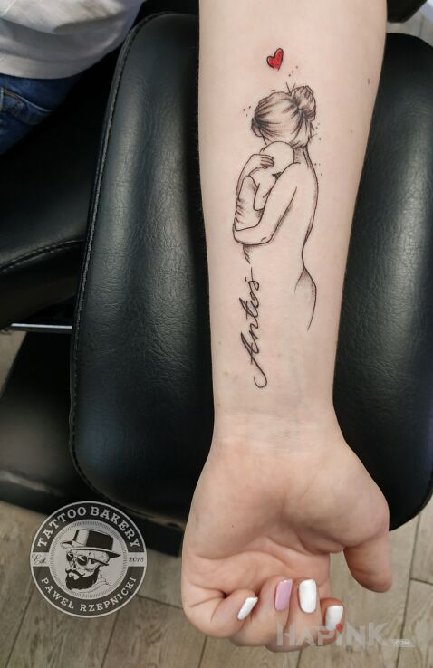 Tattoo Matka i dziecko in lettering motif and graphic / illustrative style on the forearm
