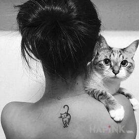 Tattoo Kitty on the back motif: animals style: minimalistic