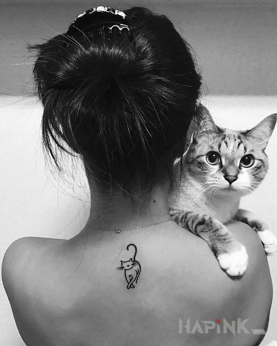 Tattoo Kicia in animals motif and minimalistic style on the back