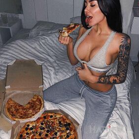 Tattoo Large pizzas :) on the forearm motif: black and gray