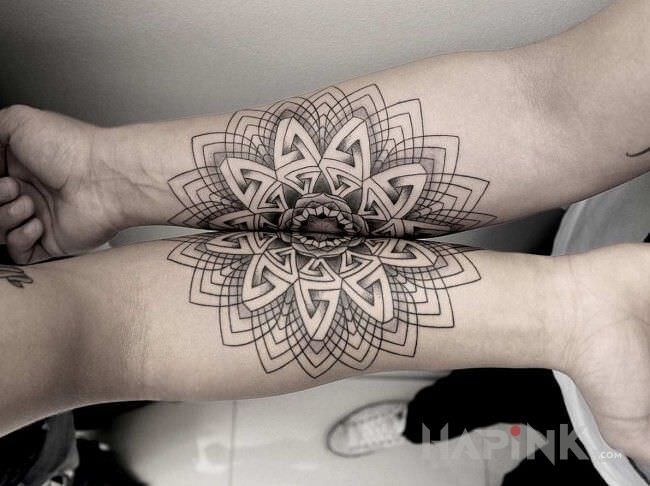Tattoo Dwie mandale in black and gray motif and geometric style on the forearm