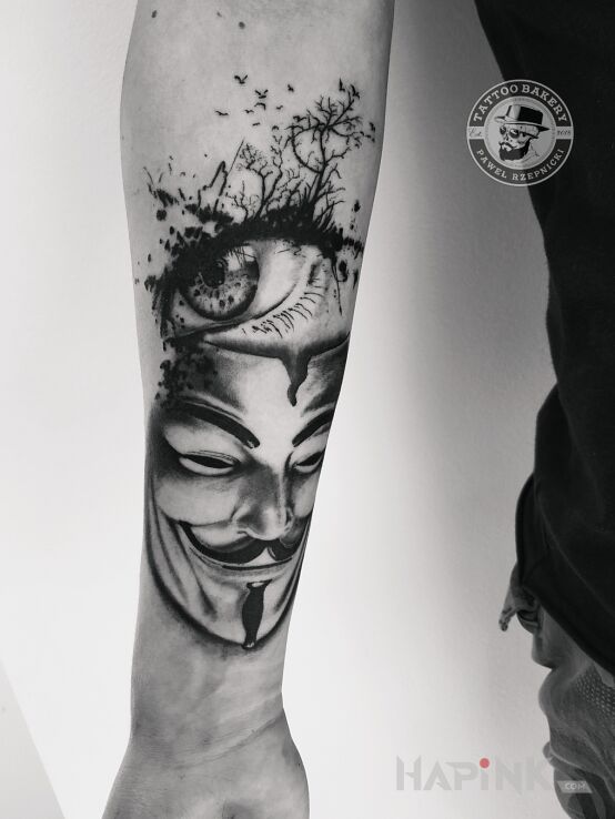Tattoo Maska in black and gray motif and realistic style on the forearm