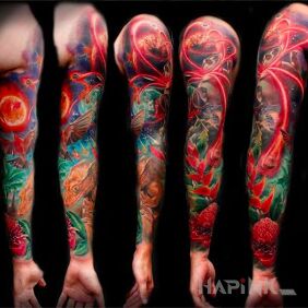 Tattoo Colors on full on the upper arm motif: flowers style: surrealistic