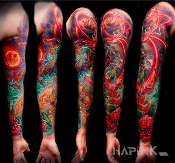 Tattoo Kolory na full in flowers motif and surrealistic style on the forearm