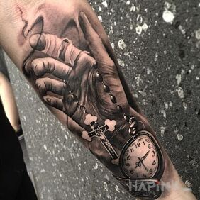 Tattoo Rosary on the forearm motif: objects style: realistic