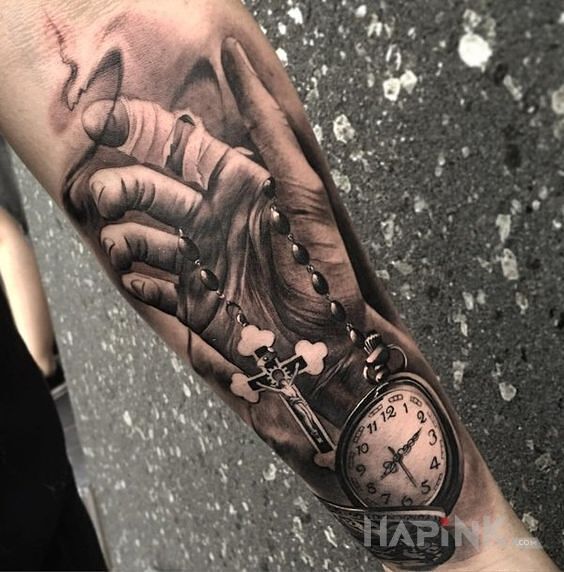 Tattoo Różaniec in 3D motif and realistic style on the forearm