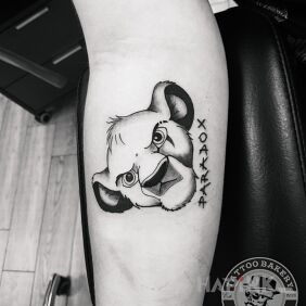 Tattoo Paradox on the forearm motif: black and gray style: graphic / illustrative