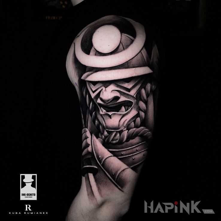 Tattoo Samuraj in characters motif and graphic / illustrative style on the upper arm