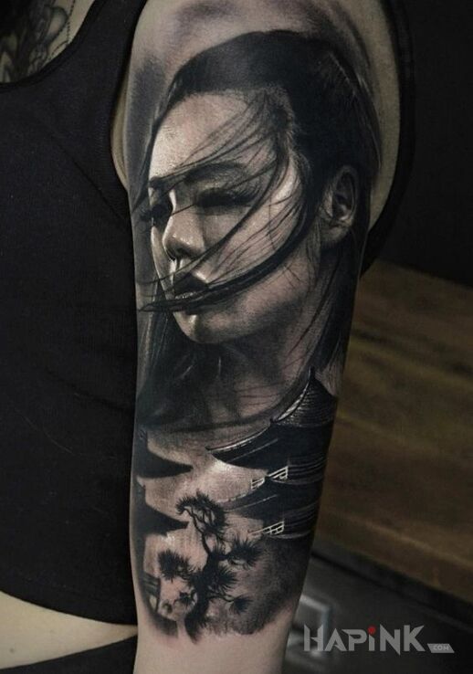 Tattoo Portret Japonki in faces motif and realistic style on the upper arm
