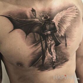 Tattoo Dual nature on the chest motif: black and gray style: realistic