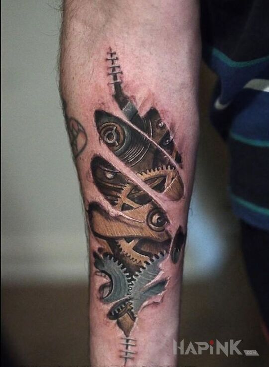 Tattoo Koła i trybiki in other motif on the forearm