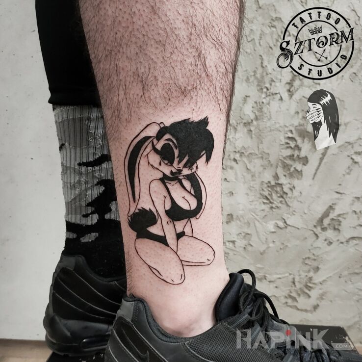 Tattoo Króliczek prosto z fantazji in characters motif and graphic / illustrative style on the calf