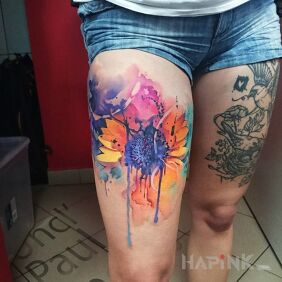 Tattoo Sunflower on the leg motif: colorful style: Watercolor