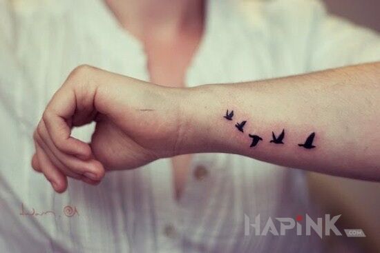 Tattoo Ptaszki in animals motif on the forearm