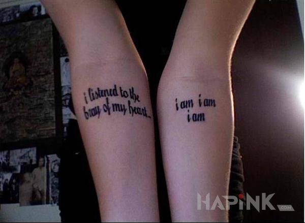 Tattoo I am, I am, I am in lettering motif on the forearm