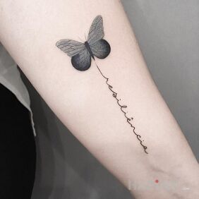 Tattoo Gray butterfly on the forearm motif: black and gray style: graphic / illustrative