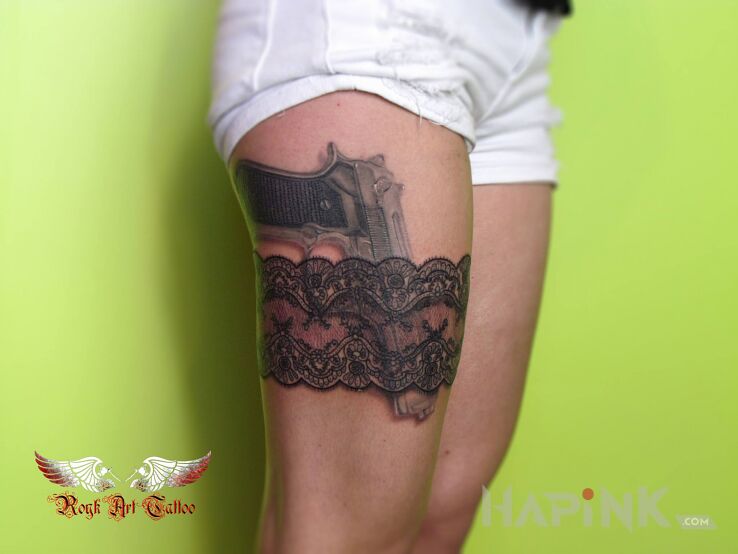 Tattoo Podwiązka in objects motif and realistic style on the leg