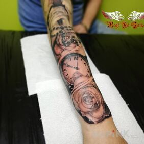 Tattoo Roses Clock on the forearm motif: black and gray style: realistic