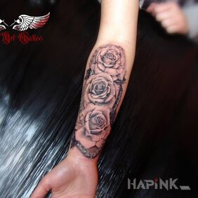 Tattoo Roses on the forearm motif: flowers style: realistic