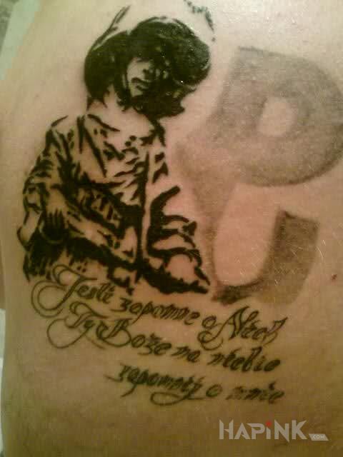 Tattoo Powstaniec in patriotic motif on the shoulder blades