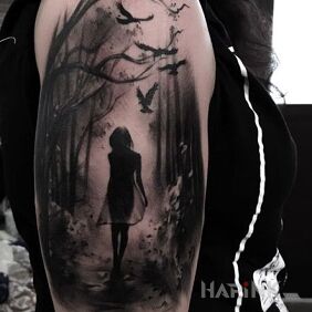 Tattoo Alone in the forest on the upper arm motif: characters style: realistic