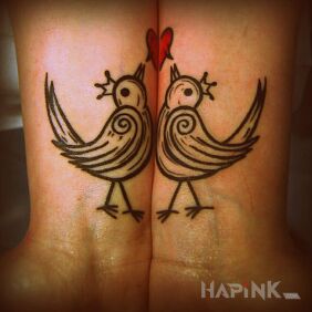 Tattoo Two birds on the forearm motif: Love style: graphic / illustrative