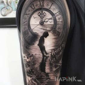 Tattoo Beautiful clock on the upper arm motif: objects style: realistic