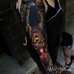Tattoo Dark girl on the upper arm motif: objects style: realistic
