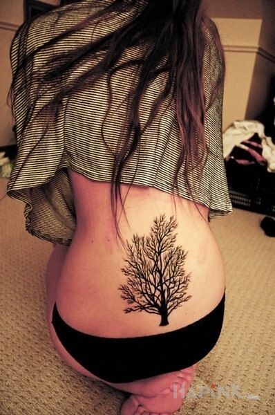 Tattoo Drzewko in other motif and blackwork / blackout style on the back
