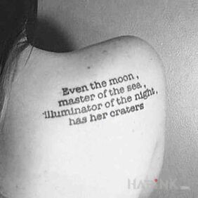 Tattoo About the moon on the shoulder blades motif: lettering style: calligraphy