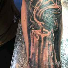 Tattoo The metaphor of death on the chest motif: objects style: realistic