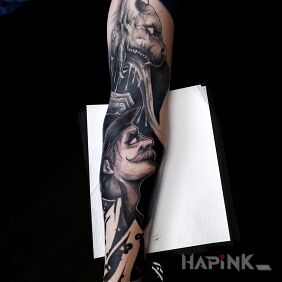 Tattoo Criminal mystery on the upper arm motif: animals style: graphic / illustrative