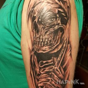 Tattoo Caesar on the upper arm motif: black and gray style: graphic / illustrative