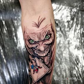 Tatuaż Joker na przedramieniu motyw: postacie styl: graficzne / ilustracyjne