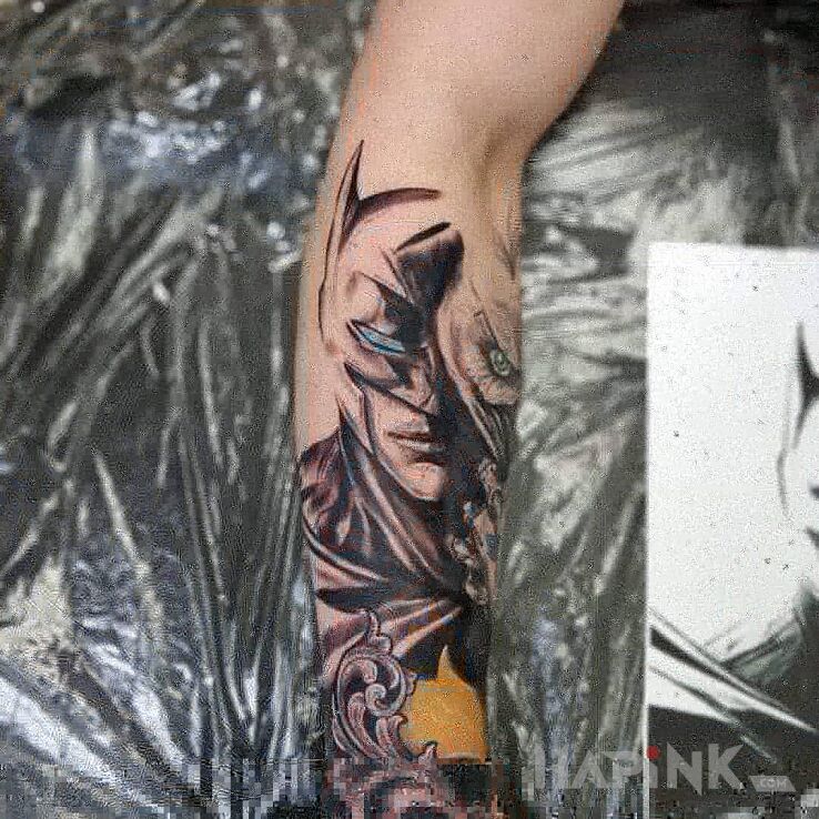 Tattoo Batman in characters motif and graphic / illustrative style on the forearm