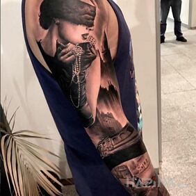 Tattoo Blinded girl on the upper arm motif: sleeves style: realistic
