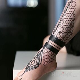 Tattoo Interesting design near the ankle motif: other style: blackwork / blackout