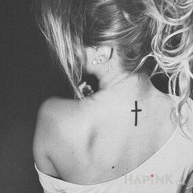 Tattoo Cross on the back motif: religious style: minimalistic