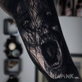 Tattoo Terrifying punch on the upper arm motif: 3D style: realistic