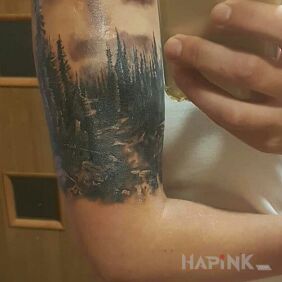 Tattoo Forest on the forearm motif: nature style: realistic