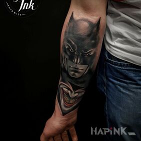 Tattoo Batmanik on the forearm motif: faces style: realistic