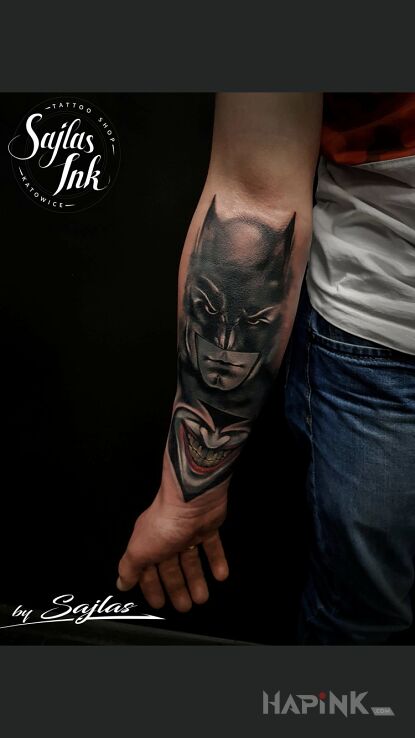 Tattoo Batmanik in black and gray motif and realistic style on the forearm