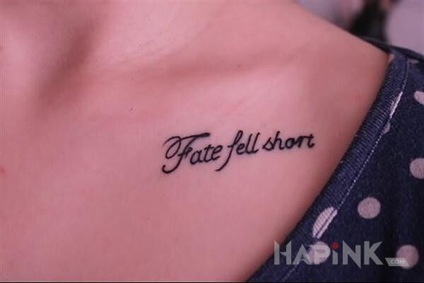 Tattoo Fate fell shore in lettering motif on the chest