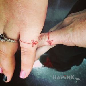 Tattoo Dla zakochańców in Love motif on the fingers