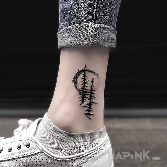 Tattoo Dwie choinki in other motif and graphic / illustrative style near the ankle